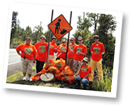 a group of people posing for the camera
