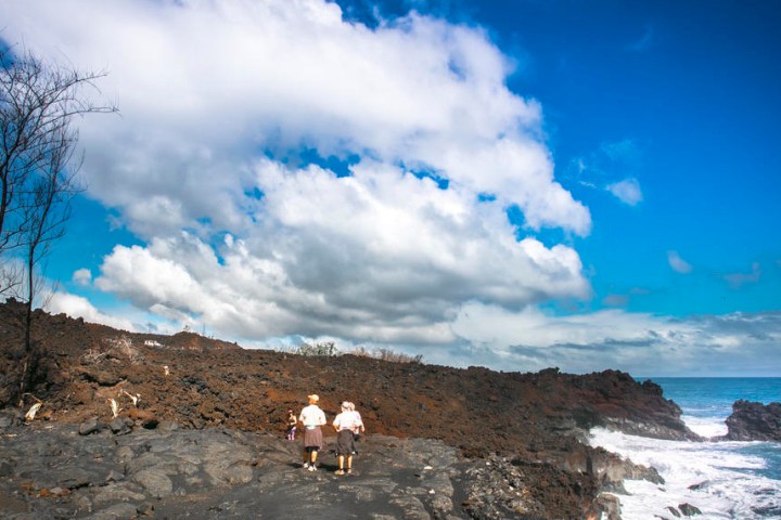 a man riding on top of a mountain